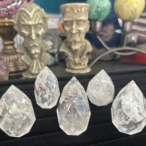 High quality set of five, faceted crystal quartz, cut base eggs.